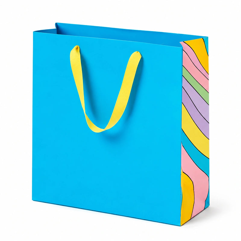Borsa regalo 32 x 12 x 26 cm in carta blu con manici gialli stile grafico