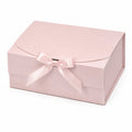 Scatola regalo 30 x 22 x 12 cm in cartone rosa con fiocco decorativo